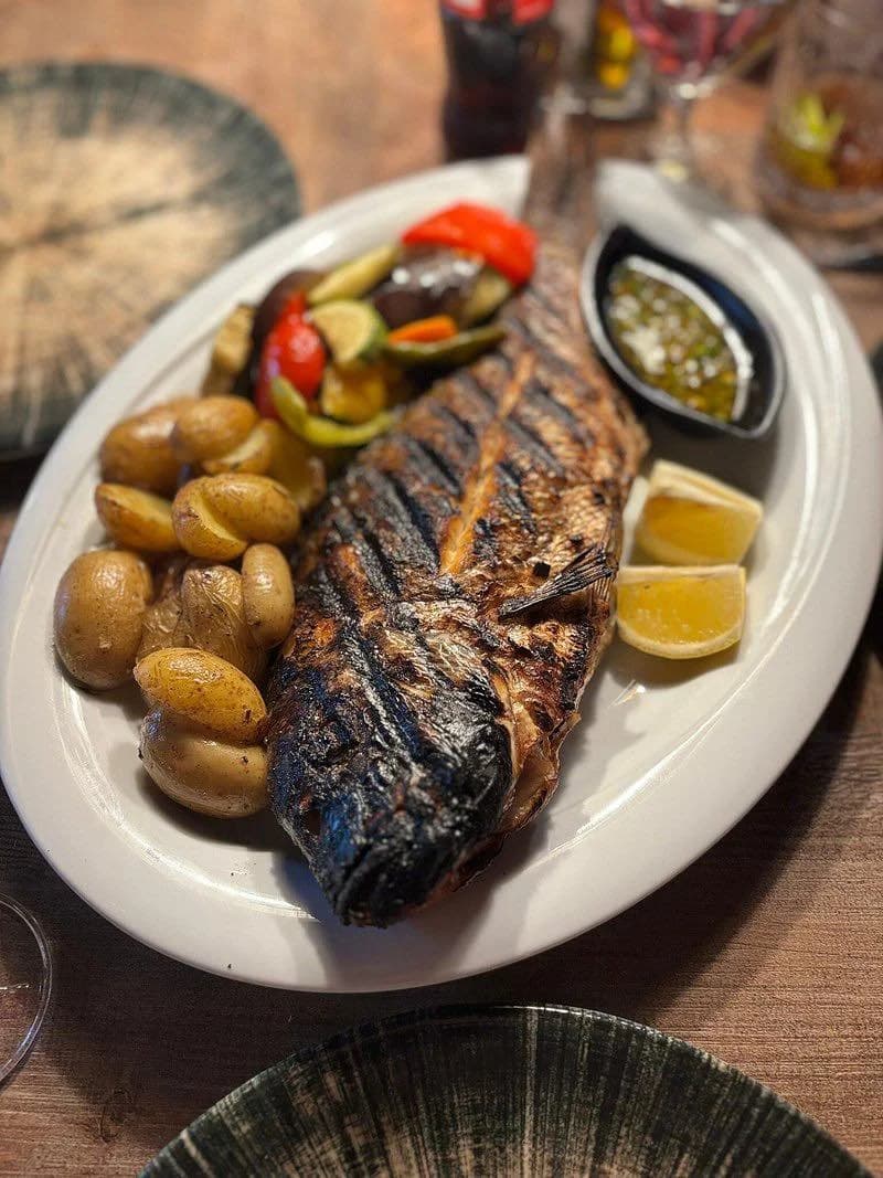 grilled fish potatoes and vegetables